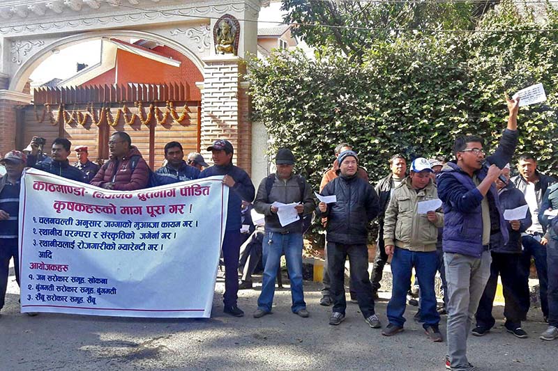 Youths of Khokana, Bungamati and Sainbu stage a rally for protection of farmers' right to land along the under-construction Kathmandu-Nijgadh fast track, in Lalitpur, on Monday, December 19, 2016. The locals have been demanding a due compensation to the land that the project would acquire. Photo Courtesy: Krishna Sharan Dongol