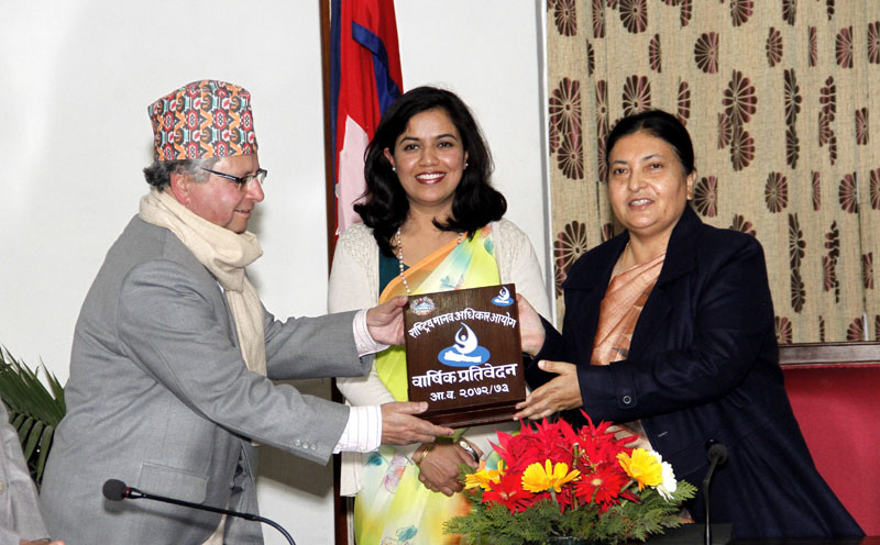 The National Human Rights Commission (NHRC) Chief Anup Raj Sharma presents annual report of the constitutional body of fiscal year 2015/16 to President Bidya Devi Bhandari at Sheetal Niwas in Kathmandu on Friday, January 13, 2017. Photo: President's Office