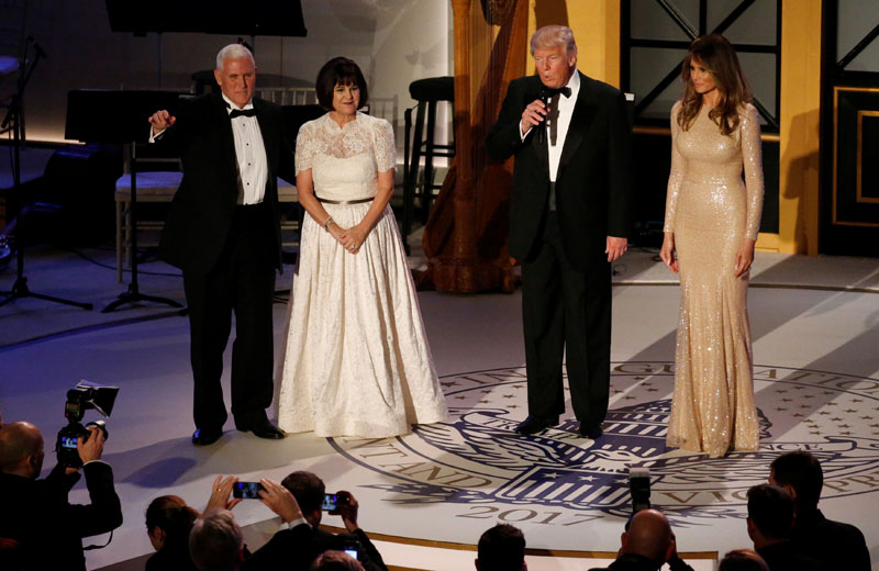 US President-elect Donald Trump (2nd from left) and his wife Melania take the stage with Vice President-elect Mike Pence (left) and his wife Karen at a pre-inauguration candlelight dinner with supporters at Union Station in Washington, US on January 19, 2017. Photo: Reuters