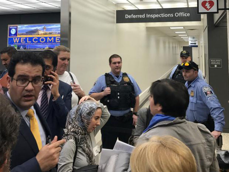 Lawyers gather to discuss how to gain access to a detainee held under a travel ban imposed by US President Donald Trump's executive order, at Washington Dulles International Airport in Dulles, Virginia, US, on January 28, 2017. Photo: Reuters