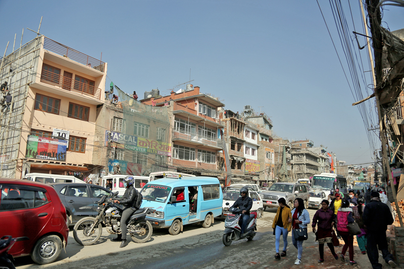 Pedestrians are seen walking along a congested pavement along the Chabahil-Shanku road section, in Kathmandu, on Monday, January 23, 2017. Photo: RSS