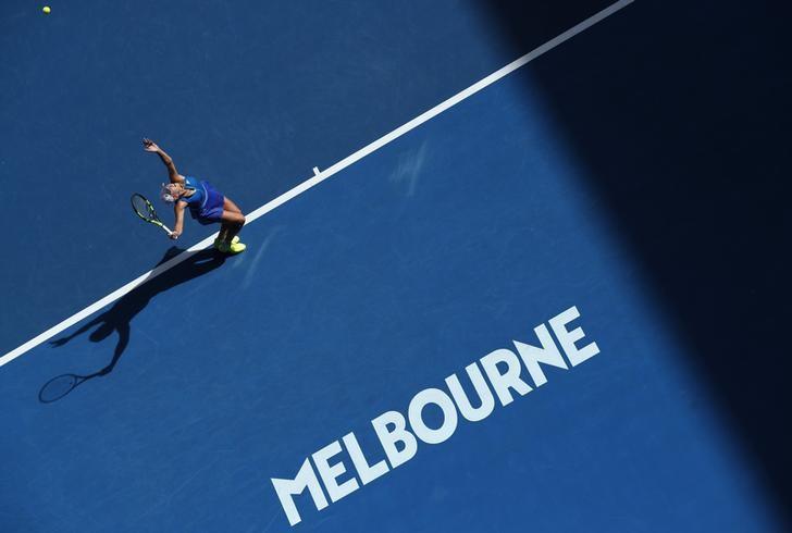 Tennis - Australian Open - Melbourne Park, Melbourne, Australia - 17/1/17 Denmark's Caroline Wozniacki serves during her Women's singles first round match against Australia's Arina Rodionova. REUTERS/Edgar Su