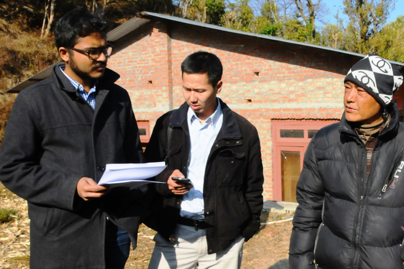 The World Bank's Research Analyst Sahil Karpe (left) and Field Coordinator Odbayar Batmunkh (centre) talk to a goat farmer in Chyasingkharka of Kavrepalanchok district during the impact assessment of Project for Agriculture Commercialisation and Trade (PACT), on January 12, 2017. Photo: PACT