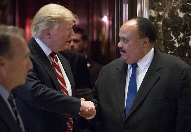President-elect Donald Trump shakes hands with Martin Luther King III, son of Martin Luther King Jr at Trump Tower in New York, on Monday, January 16, 2017. Photo: AP