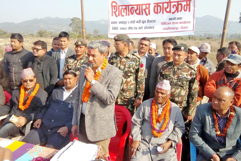 Minister for Physical Infrastructure and Transport Ramesh Lekhak speaking at the foundation stone laying programme for the bridge over Chandi Khola, in Rautahat, on Monday, January 9, 2017. Photo: THT