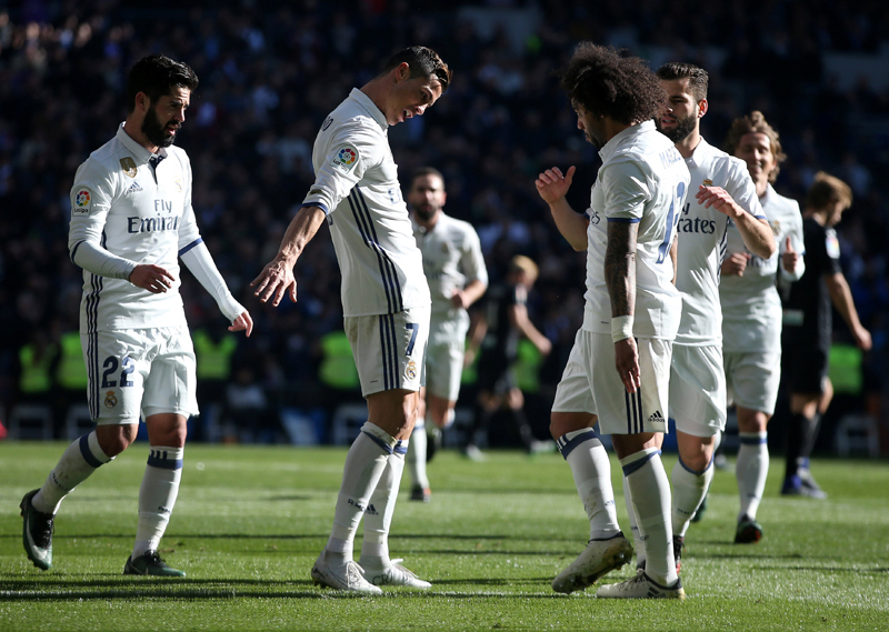 Real Madrid's Cristiano Ronaldo celebrates his first goal. Photo: Reuters