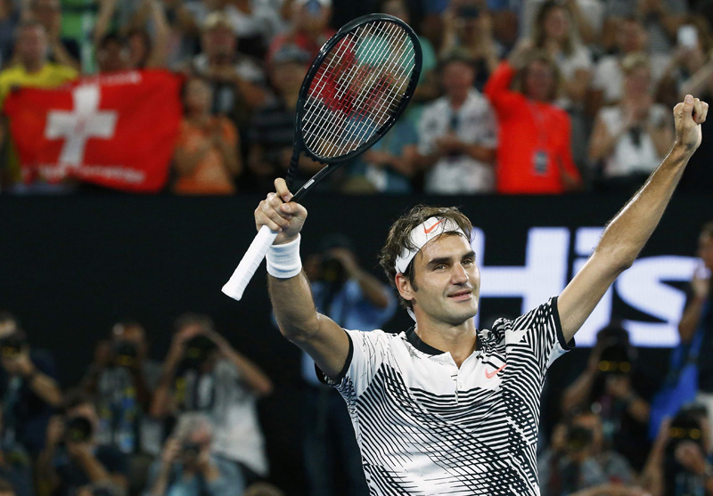 Switzerland's Roger Federer celebrates winning his Men's singles fourth round match against Japan's Kei Nishikori. Photo: Reuters