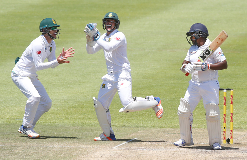 South Africa's Quinton de Kock appeals unsuccessfully for a catch off Sri Lanka's Rangana Herath. Photo: Reuters