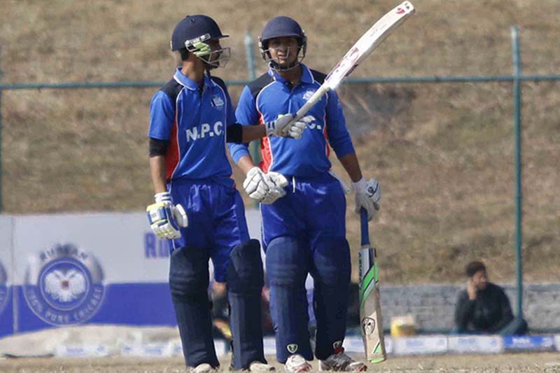 NPC's Sunil Dhamala (left) acknowledges the crowd after scoring a half century against Himalayan Cricket Academy during their second Ruslan Cup Twenty20 match at the TU Stadium in Kathmandu on Tuesday, January 10, 2016. Photo: Udipt Singh Chhetry/THT