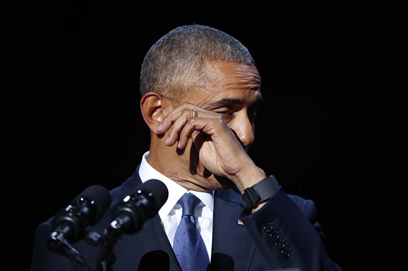 US President Barack Obama wipes away tears while speaking during his farewell address at McCormick Place in Chicago, Tuesday, on January 10, 2017. Photo: AP