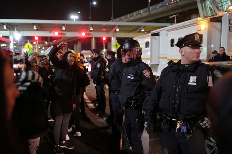 Protesters gather outside Terminal 4 at JFK airport in opposition to US president Donald Trump's proposed ban on immigration in Queens, New York City, US, on January 28, 2017. Photo: Reuters