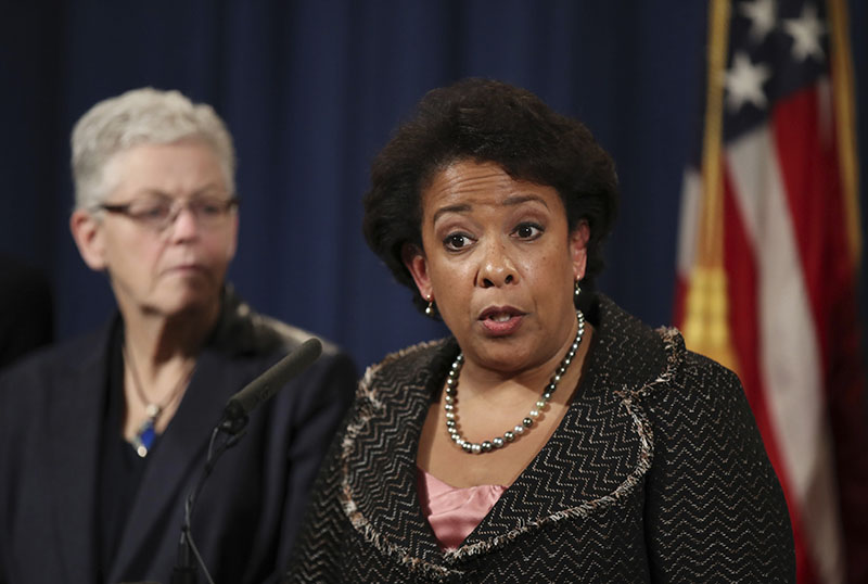 Attorney General Loretta Lynch with Environmental Protection Agency (EPA) Administrator Gina McCarthy, speaks during a news conference at the Justice Department in Washington, on Wednesday, January 11, 2017, announcing criminal and civil resolutions with Volkswagen. Photo: AP