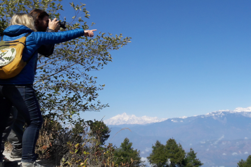 Tourists take pictures of various mountains from Kakani of Nuwakot district, on Saturday, January 28, 2017. Photo: Prakash Singh