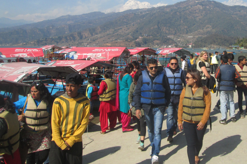 Domestic and foreign tourists throng the shore of Phewa Lake in Pokhara of Kaski district, on Sunday, January 29, 2017. Photo: Rishi Ram Baral