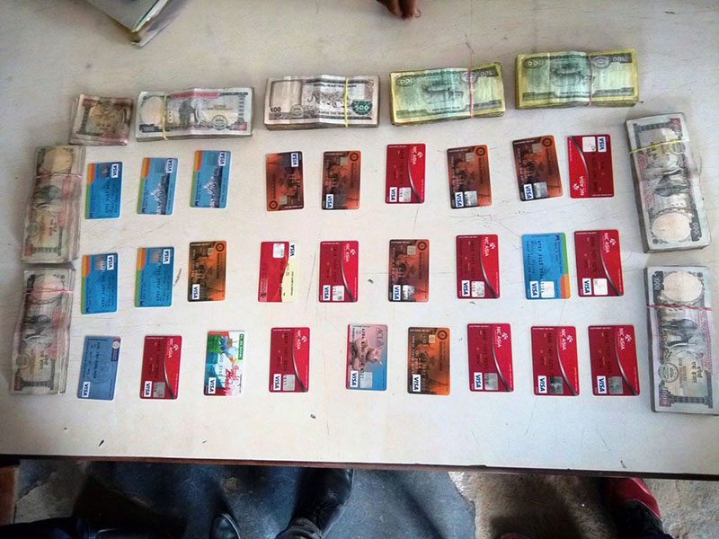 District Police Office, Rautahat, parades the confiscated ATM cards and cash, on Thursday, February 16, 2017. Photo: Prabhat Kumar Jha