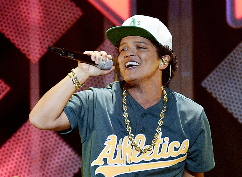 FILE - Bruno Mars performing at the 2016 Jingle Ball in Los Angeles, on December 2, 2016. Photo: AP