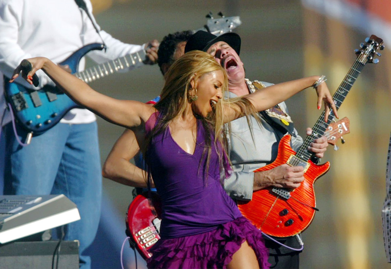 FILE - In this January 26, 2003, file photo, Beyonce and guitarist Carlos Santana perform for the pre-game show before the start of Super Bowl XXXVII in San Diego. Photo: AP