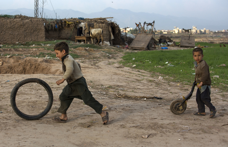 Afghan children play in a refugee camp situated in the suburbs of Islamabad, Pakistan, Monday, Feb. 20, 2017. Photo: AP
