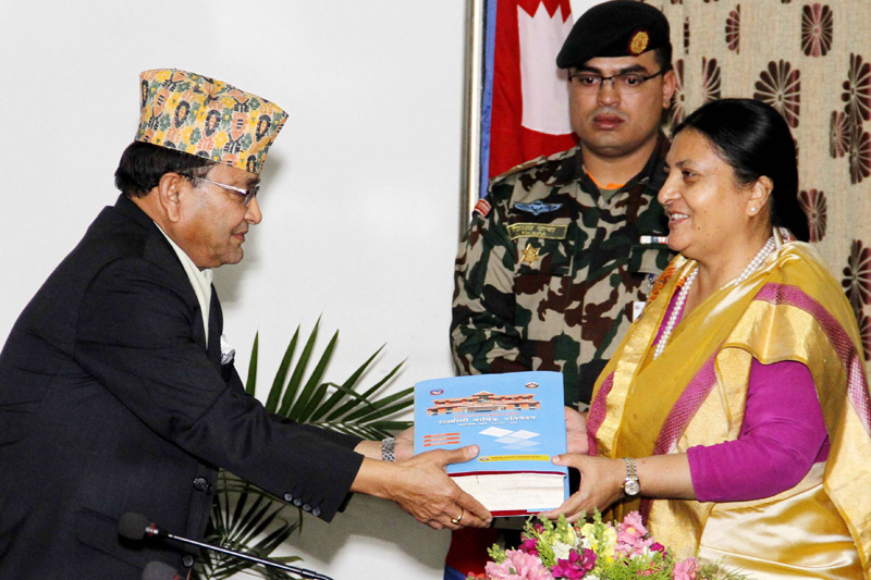 The Acting Chief Commissioner of Commission for the Investigation of Abuse of Authority Deep Basnyat submits annual report to the President Bidya Devi Bhandari in Sheetal Niwas, Kathmandu, on Wednesday, February 1, 2017. Photo Courtesy: President's Office