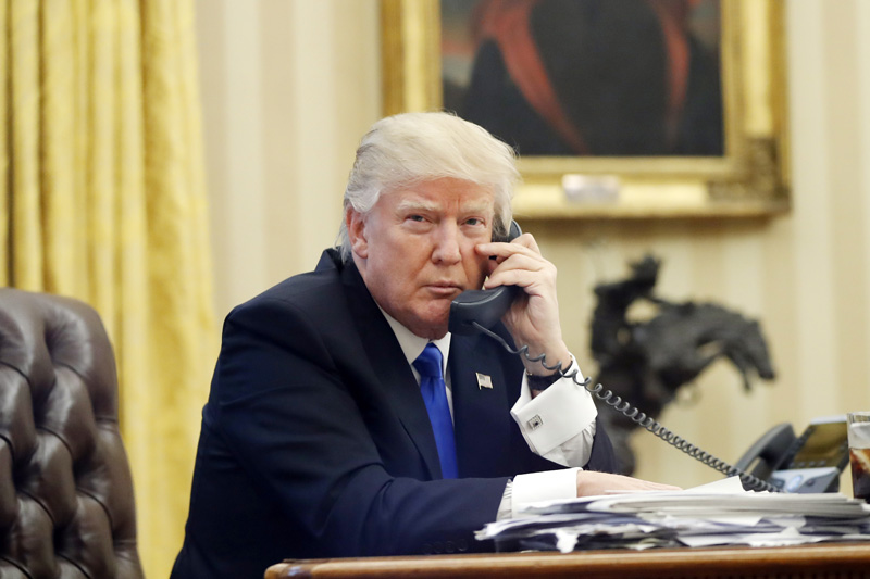 FILE - In this Jan. 28, 2017, file photo, US President Donald Trump speaks on the phone with Prime Minister of Australia Malcolm Turnbull in the Oval Office of the White House in Washington. Photo: AP