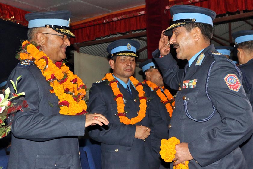 DIG Jaya Bahadur Chand, who has been appointed IG, salutes his outgoing boss. Photo: RSS