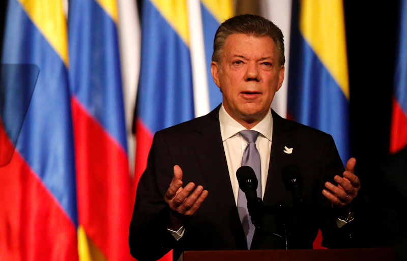 File - Colombia's President Juan Manuel Santos gives his speech after signing a new peace accord with Marxist FARC rebel leader Rodrigo Londono, known as Timochenko, in Bogota, Colombia, on November 24, 2016. Photo: Reuters