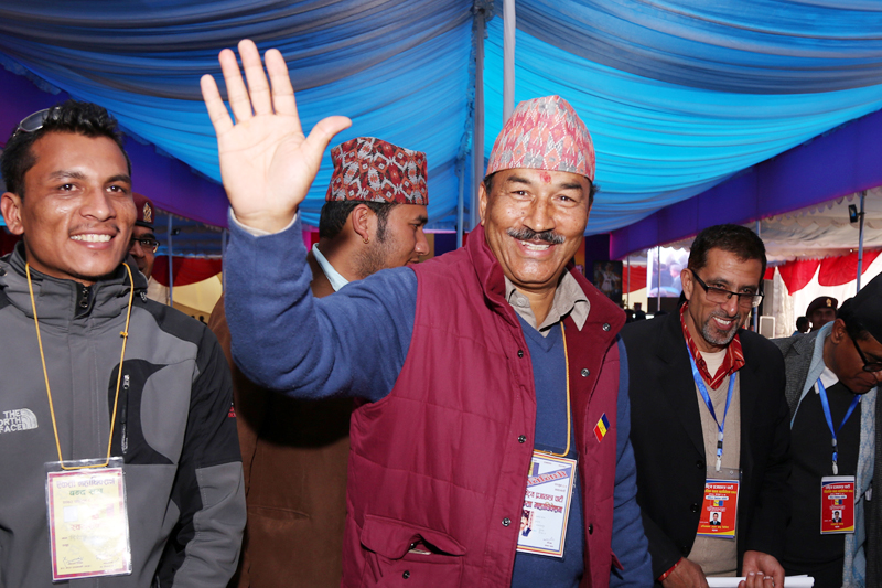 Rastriya Prajatantra Party Chairman Kamal Thapa waves after casting his vote in the party's Central Committee election during the party's unity conventation in Bhrikutimandap of Kathmandu, on Monday, February 20, 2017. Photo: RSS