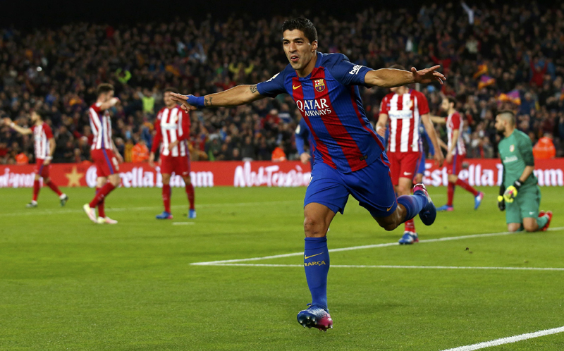 Barcelona's Luis Suarez celebrates after scoring their first goal. Photo: Reuters