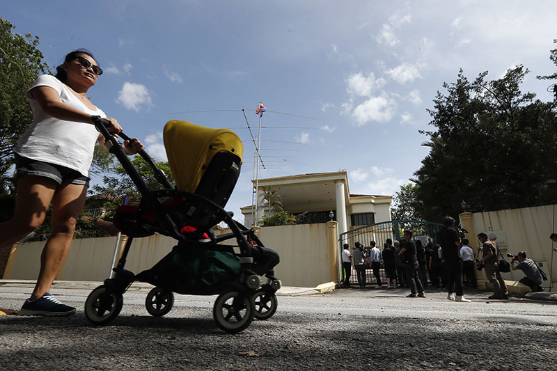 A mother push stroller passing by at North Korean Embassy in Kuala Lumpur, Malaysia, on Tuesday, February 28, 2017. Photo: AP