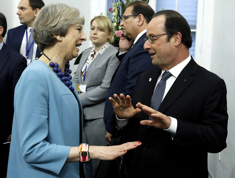 British Prime Minister Theresa May and French President Francois Hollande attend the European Union leaders summit in Valletta, Malta, February 3, 2017. Photo: AP