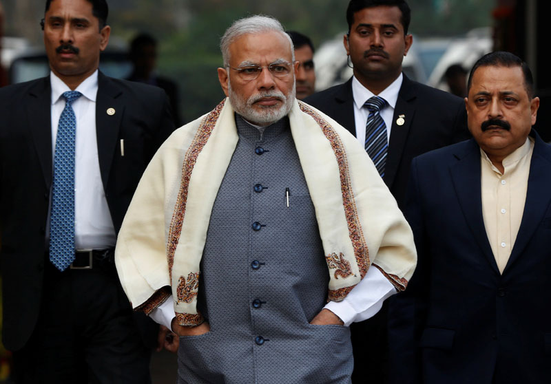 Prime Minister Narendra Modi walks to speak with the media as he arrives at the parliament house to attend the first day of the budget session, in New Delhi, India, on January 31, 2017. Photo: Reuters