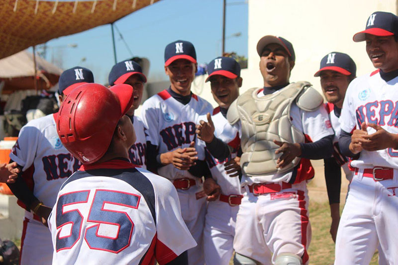 Nepal national baseball team players celebrate after beating Iraq in the 13th BFA Asia Baseball nChampionship match in Islamabad, Pakistan on Sunday, February 26, 2017. Photo: THT
