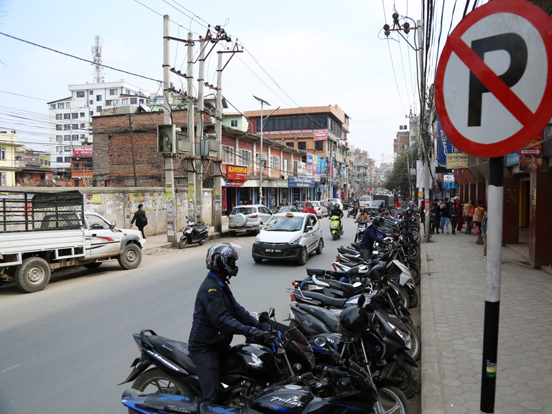 Motorcyclists prepare to park their two-wheelers at a no parking zone in Bagbazaar of Kathmandu, on Wednesday, February 15, 2017. Photo: RSS