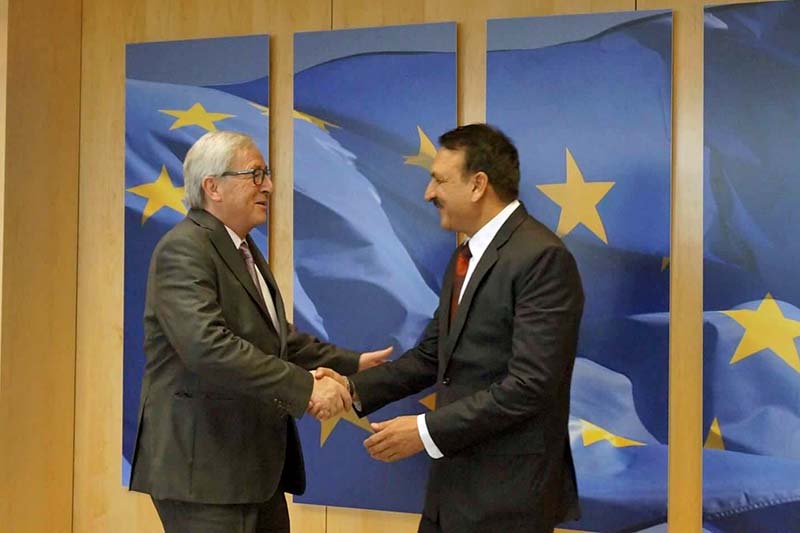 Foreign Minister Prakash Sharan Mahat (right) shakes hands with European Commission President Jean-Claude Juncker during a meeting held in the latter's office, in Brussels on Wednesday, February 15, 2017. Photo Courtesy: MoFA