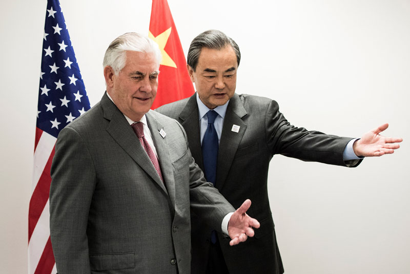 US Secretary of State Rex Tillerson (left) and China's Foreign Minister Wang Yi take their seats before a meeting on the sidelines of a gathering of Foreign Ministers of the G20 leading and developing economies at the World Conference Center in Bonn, western Germany, on February 17, 2017. Photo: Reuters