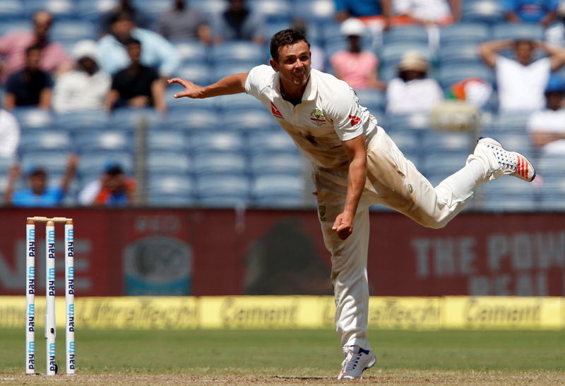 Australia's Steve O'Keefe celebrates the wicket of India's captain Virat Kohli. Photo: Reuters