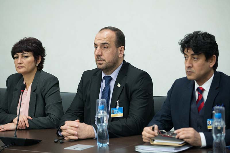 Syria's opposition delegation head Nasr al-Hariri (centre) attends a meeting of Intra-Syria peace talks with UN Special Envoy for Syria Staffan de Mistura at Palais des Nations in Geneva, Switzerland, on February 24, 2017. Photo: Reuters