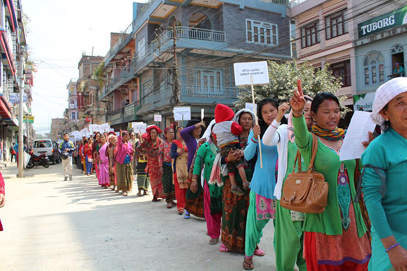 Locals taking out a protest rally against discrimination in compensation distribution to families affected by Tanahun Hydro Power Project in Damauli, on Wednesday, February 22, 2017.Photo: THT