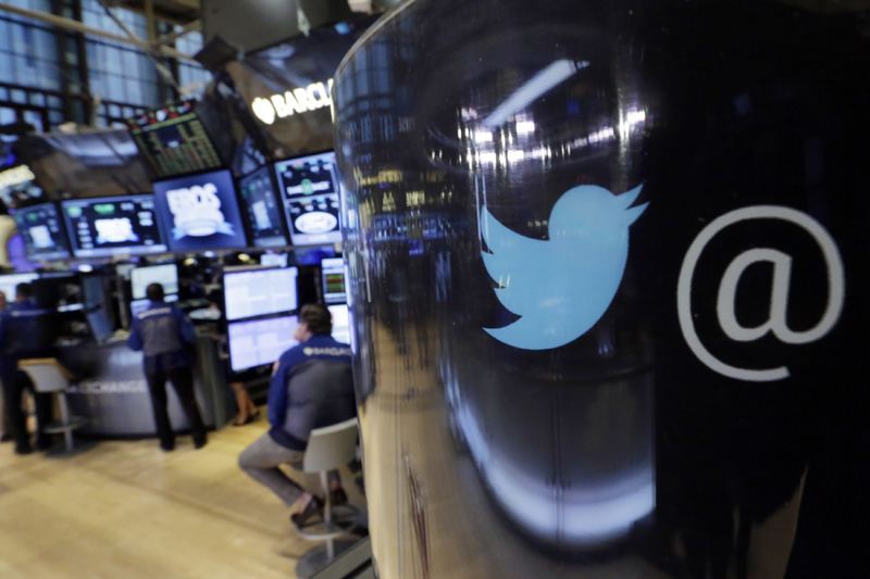 FILE - In this Tuesday, Oct. 13, 2015, file photo, the Twitter logo appears on a phone post on the floor of the New York Stock Exchange. Photo: AP
