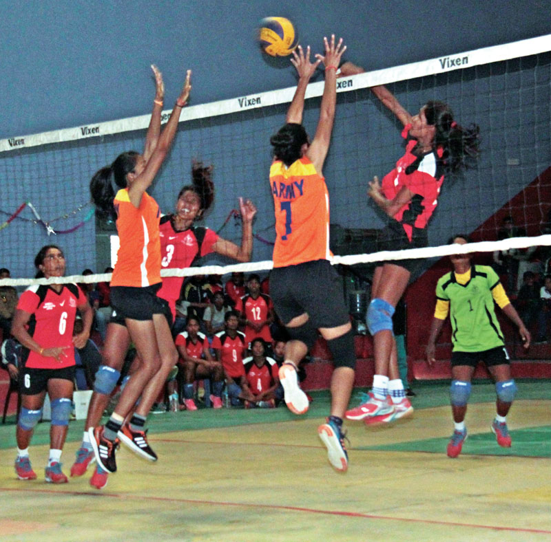 Players of the TAC (left) and Nepal APF Club in action during the fourth PM Cup Womenu0092s Volleyball Tournament match, in Nepalgunj, on Monday, February 27, 2017. Photo: THT