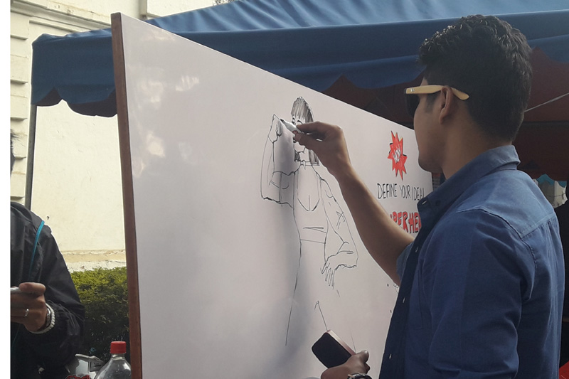 A youth takes part at the Define Your Ideal Superhero activity during the during the u0093Women of the World (WOW) Festival Kathmanduu0094, at the Staff College in Jawalakhel, Lalitpur, on Saturday, February 18, 2017. Photo: Nasana Bajracharya