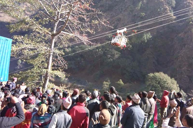 Locals of Badimalika Municipality gather to see the new ropeway service that came into operation, in Bajura, on Sunday, February 12, 2017. Photo: Prakash Singh