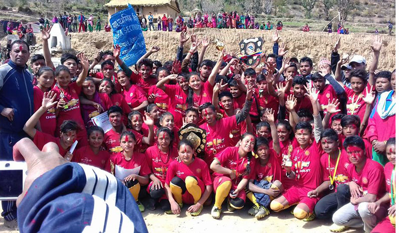 Students of Malika Higher Secondary School in Bajura district pose for a photo after winning the 9th President Running Shield Competition, on Saturday, March 04, 2017. Photo: RSS