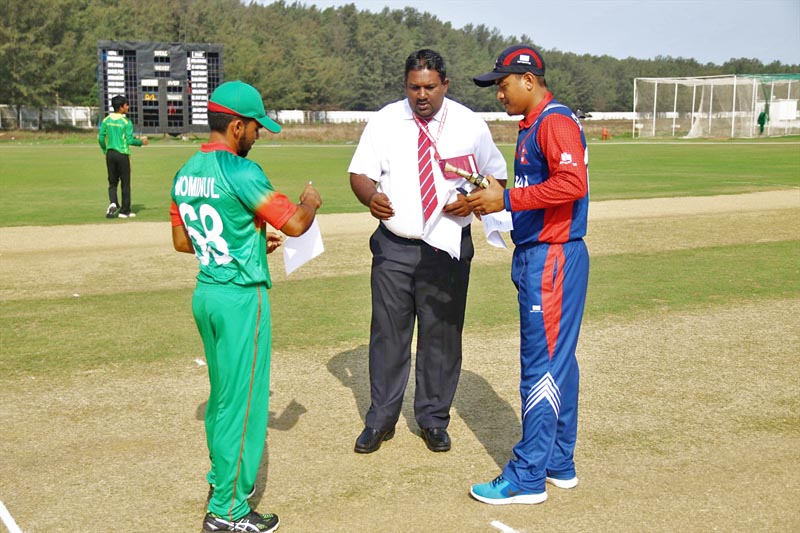 Bangladesh U-23 captain Mominul Haque and Nepal's stand-in skipper Gyandendra Malla look on during a toss in presence of ICC match referee during the ACC Emerging Teams Cup in Bangladesh, on Tuesday, March 28, 2017. Courtesy: Raman Shiwakoti