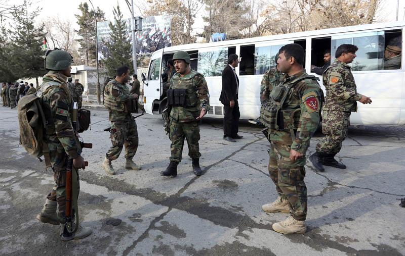 Afghan soldiers inspect the site of attack on a military hospital in Kabul, Afghanistan, Wednesday, March 8, 2017. Photo: AP