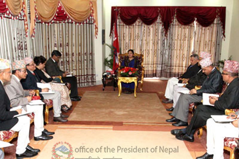 Chief of Election Commission Dr. Ayodhi Prasad Yadav along with other commissioners briefs President Bidya Devi Bhandari about preparations for the upcoming locall polls, at the Sheetal Niwas in Kathmandu, on Friday, March 31, 2017. Photo: President's Office