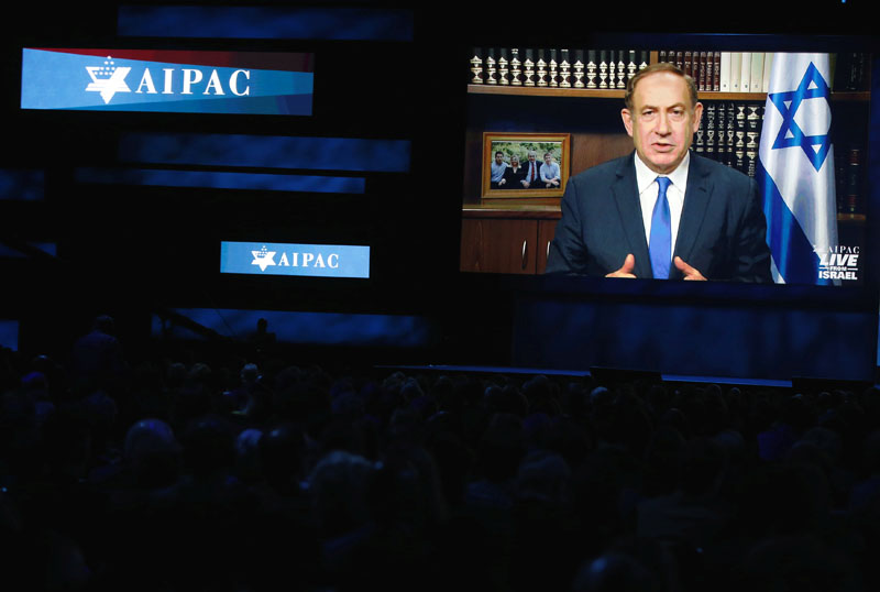 Israeli Prime Minister Benjamin Netanyahu speaks via a video link from Israel to the American Israel Public Affairs Committee (AIPAC) policy conference in Washington, US, on March 27, 2017. Photo: Reuters