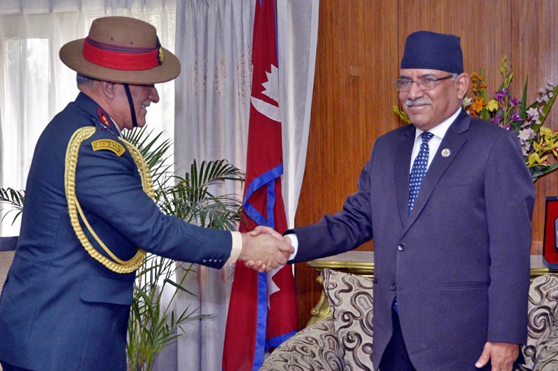 Indian Army Chief Bipin Raut shakes hands with Nepal's Prime Minister Pushpa Kamal Dahal at the latter's official residence in Baluwatar, Kathmandu, on Thursday, March 30, 2017. Photo: RSS