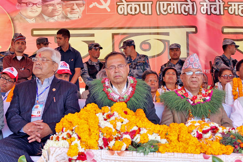 CPN-UML senior leaders from left Bam Dev Gautam, Jhalanath Khanal and Madhav Kumar Nepal attend a mass assembly programme organised during the on-going Mechi Mahakali Campaign at Bhumahi of Nawalparasi district, on Sunday, March 12, 2017. Photo: RSS