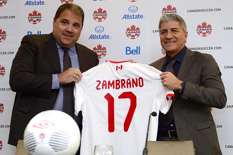 Canada Soccer president Victor Montagliani (left) introduces new head coach of the men's national team, Octavio Zambrano, at a press conference in Toronto on Friday, March 17, 2017. Photo: Frank Gunn/The Canadian Press via AP